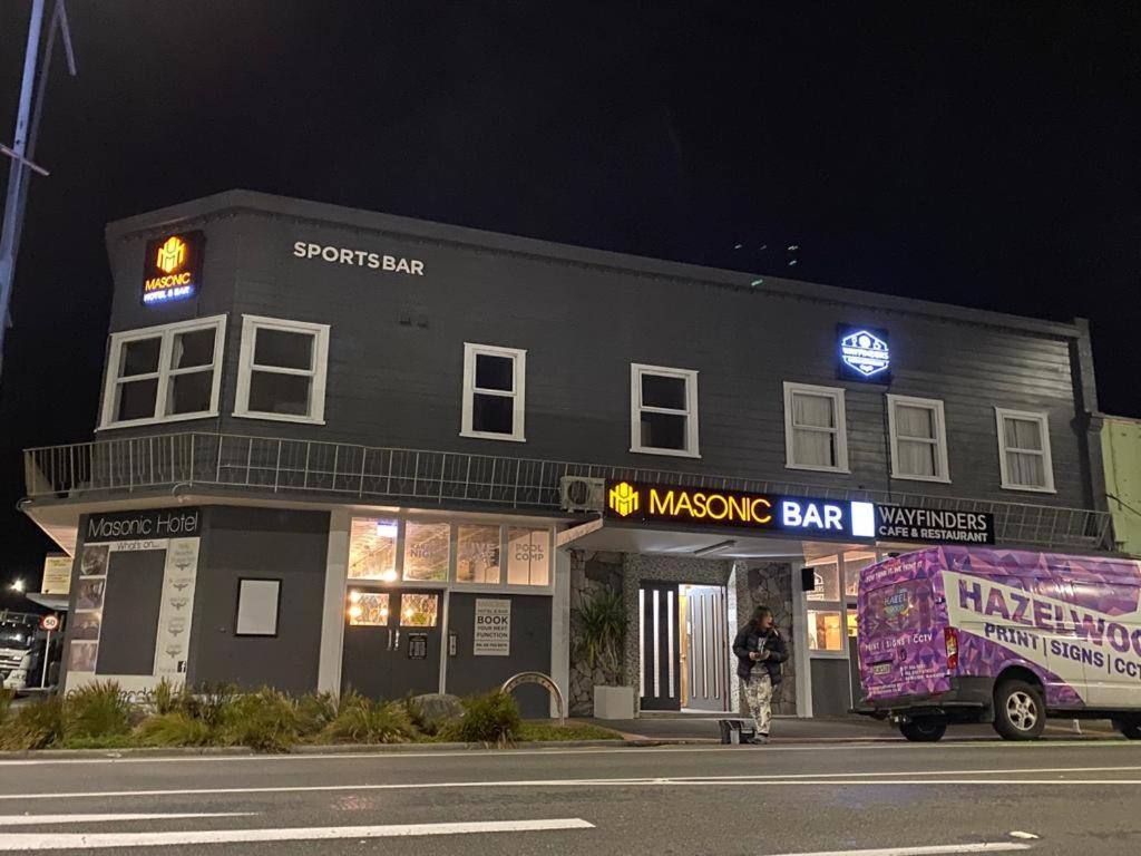 Masonic Hotel building on McLean Street, Waitara, at night